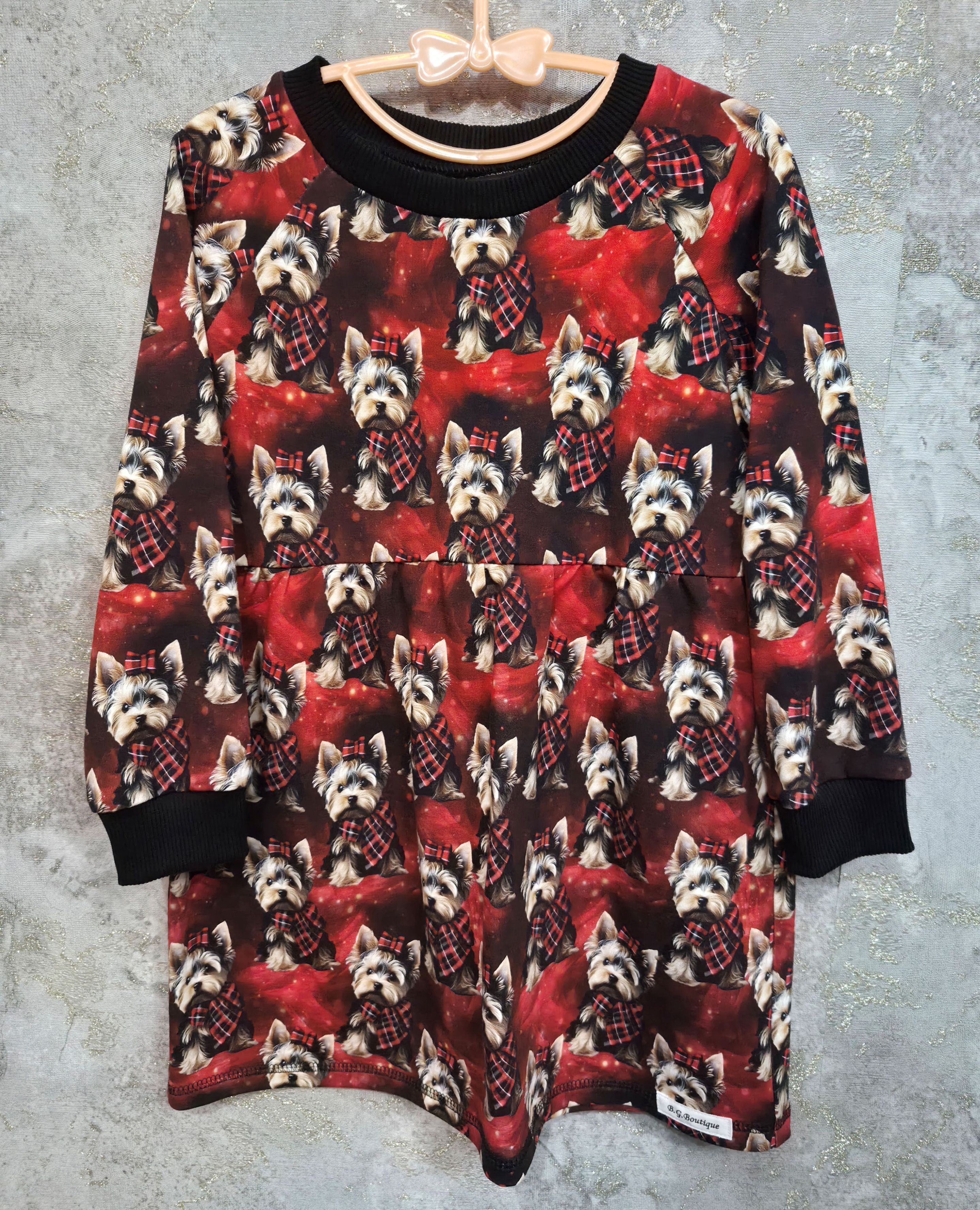 Šuniukai su kaspinėliais